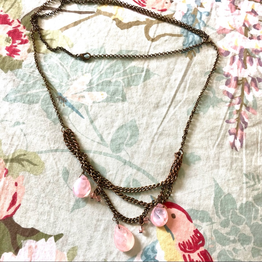Francesca’s long brass and pink layer necklace